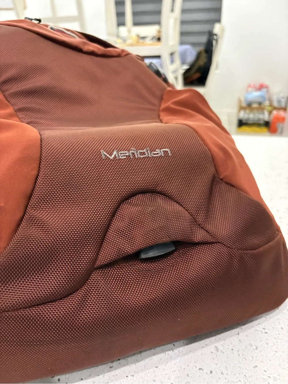 OSPREY Meridian Men's Backpack in Rust Brown